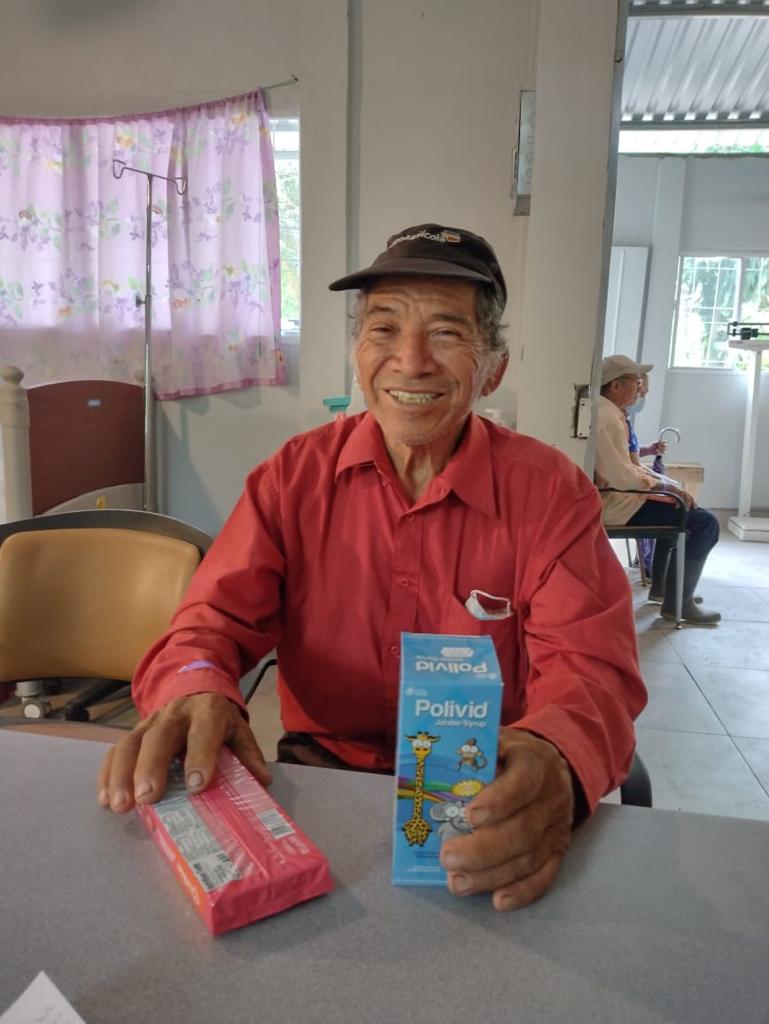 loving-with-mercy-clinic-program-senior-receiving-medical-supplies