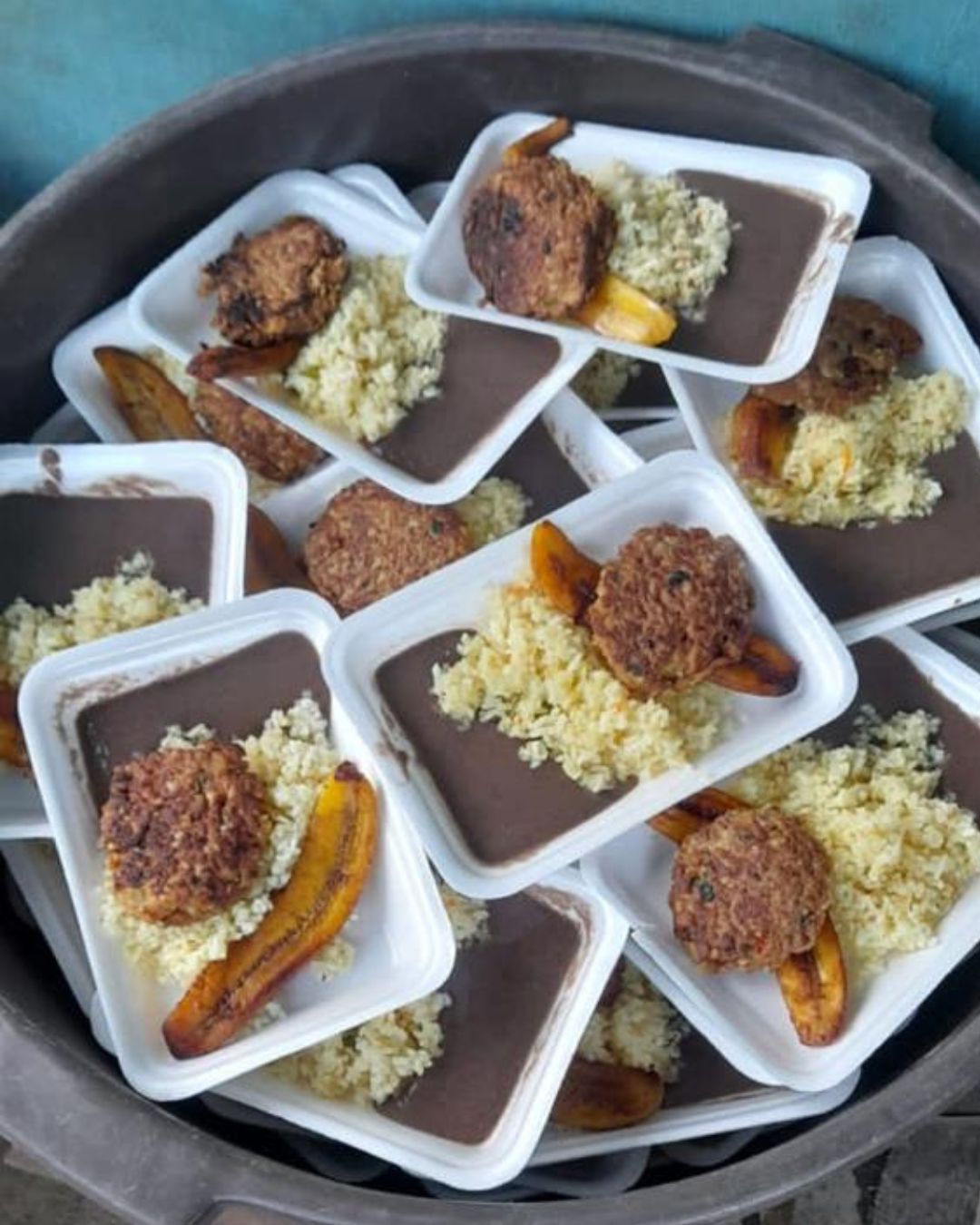 loving-with-mercy-el-salvador-feeding-program-food-plates-arranged-in-serving-tray