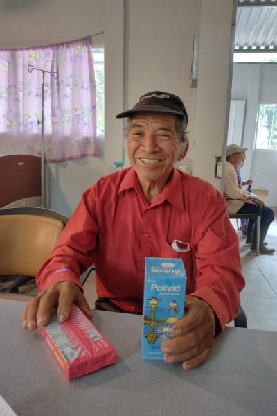 loving-with-mercy-clinic-program-senior-receiving-medical-supplies