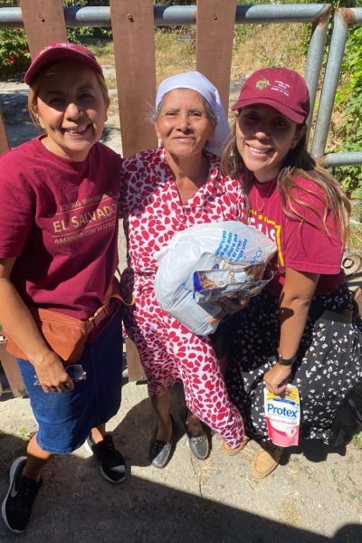 loving-with-mercy-el-salvador-community-outreach-happy-elder-with-LWM-staff